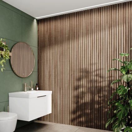 Product lifestyle image of Camden Walnut Waterproof Slatted Wall Panels in bathroom with white wall hung vanity unit and round mirror SAN103